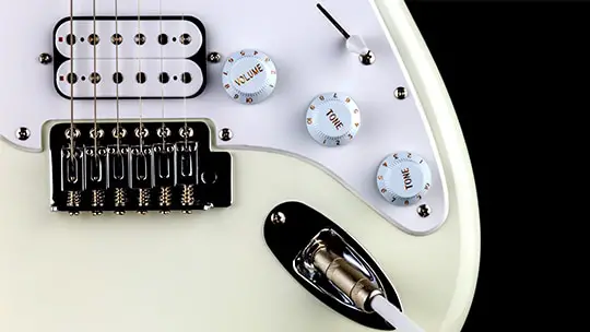 electric guitar controls closeup